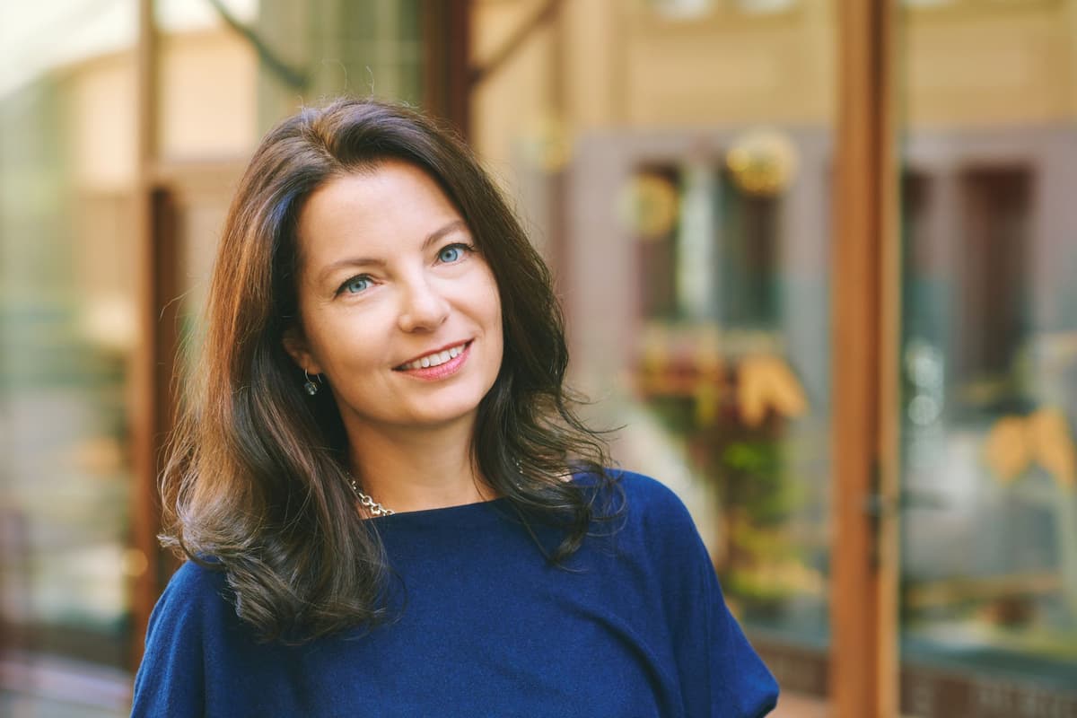 Happy patient discussing Mini-IVF benefits